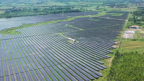 Aerial view of Ecology solar power station panels in the fields green energy. Landscape electrical i