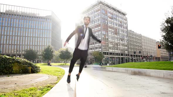 Young business man jumping outdoor