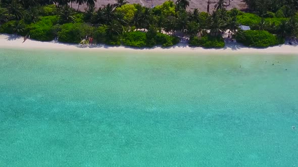 Sunny tourism of bay beach break by lagoon with sand background in sunlight