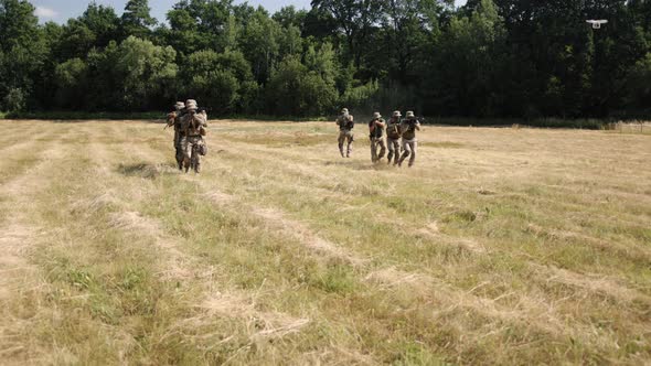 Military Special Forces Unit is on Battlefield Armed with Ammunition and Weapons to Attack Enemy