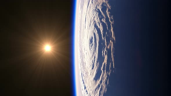 Sunrise Over A Big Hurricane. View Of Planet Earth From Space alt