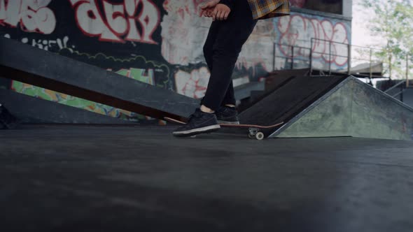 Young Skater Riding Skateboard Outside