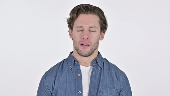 Young Man Showing Disappointment, Expression on White Background