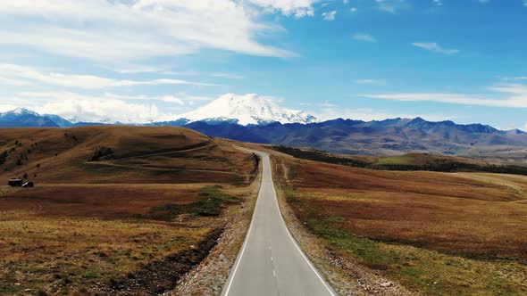 Aerial View of Amazing Road with View of the Caucasian Ridge and Mount Elbrus