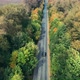 Aerial View Of White Car Driving On Country Road - VideoHive Item for Sale