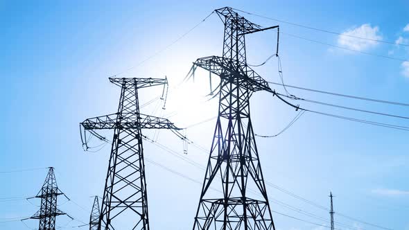 Time Lapse of Sunset with Transmission Electricity Steel Pylon Tower