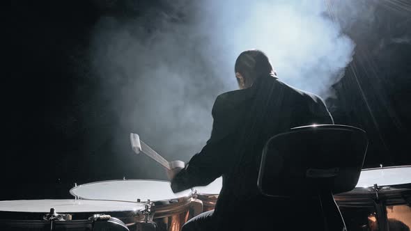 Musician Playing the Timpani