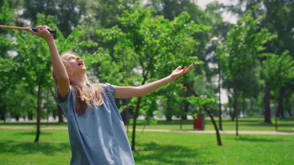 Pretty Girl Playing Badminton on Nature Close Up