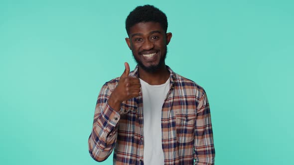 African American Happy Man in Shirt Showing Thumbs Up Nodding in Approval Successful Good Work