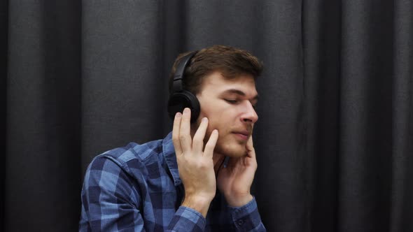 Man in headphones listening to music