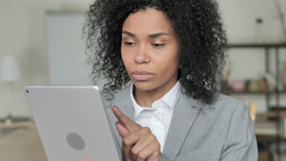 African Businesswoman Using Tablet