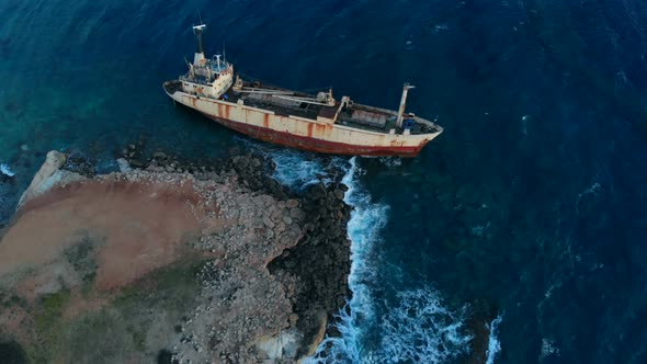 Aerial View of Shipwrecked Ship Lying Near Seashore