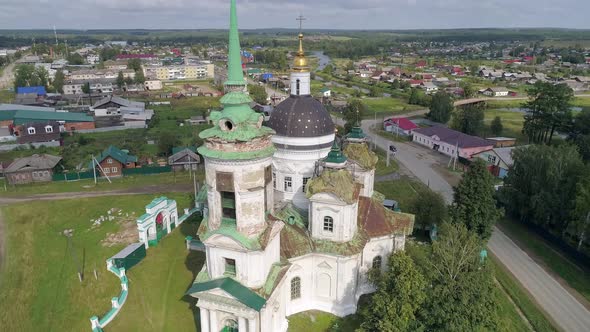 Aerial view of Church in the village, Near the river and bridge