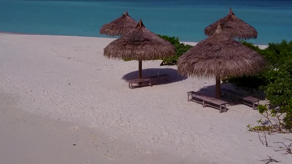 Drone aerial sky of seashore beach by blue ocean with sand background