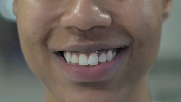 Close Up of Smiling Lips of African Woman