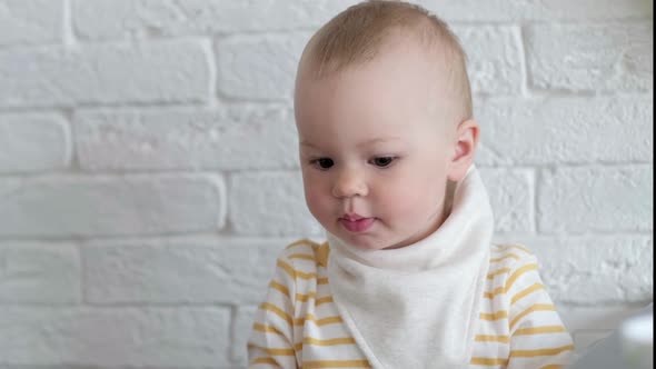 Portrait Drinking Baby at Home