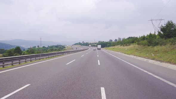 Vehicles traveling on the highway.