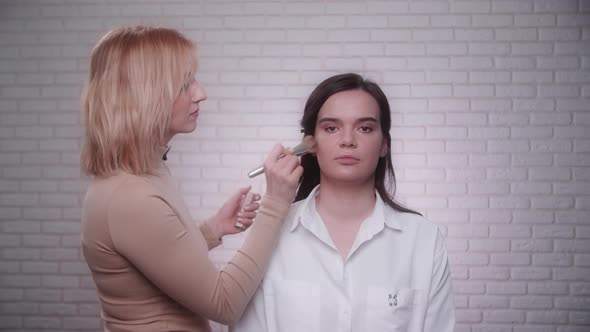 Portrait of a Young Caucasian Woman in a Process of Beauty Transformation