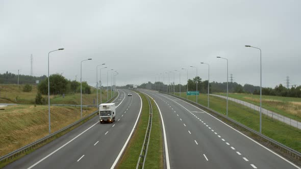 Cars Passing On The Highway 1