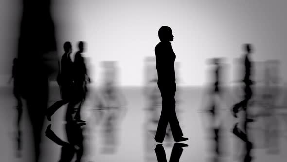 Focus on silhouette of alone woman in the crowd of people. Grey background.