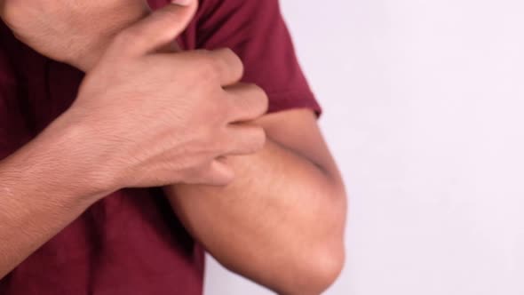 Man Suffering From Itching Skin, Close Up.