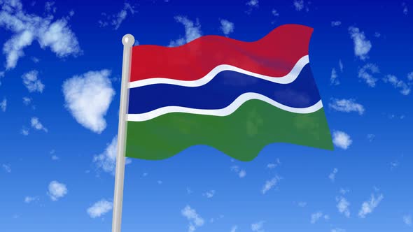 Gambia Flag Waving In The Sky With Cloud