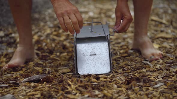 Close Up on Animal Trap Opening to Release Bird