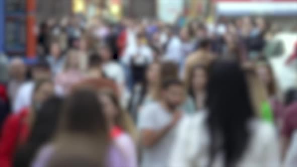 Silhouettes of People Walking in a Crowd Slow Motion