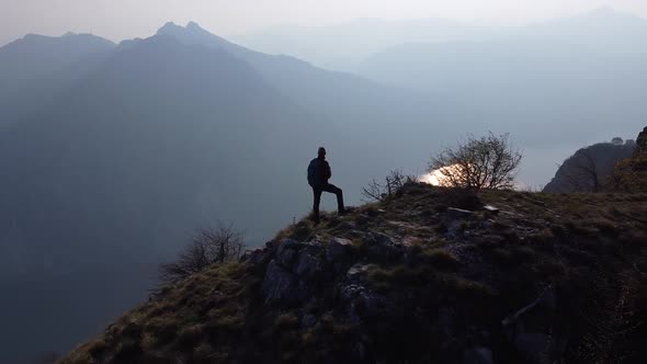 Hiker on top of the mountain, Lake Como, European Alps, Italy