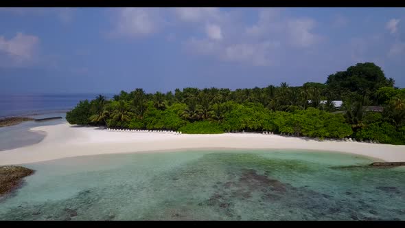 Aerial drone shot travel of idyllic sea view beach voyage by aqua blue lagoon with white sand backgr