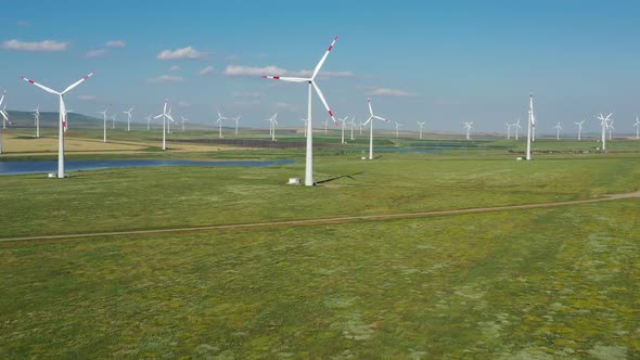 Aerial View of Windmills on Wind Farm in Rotation