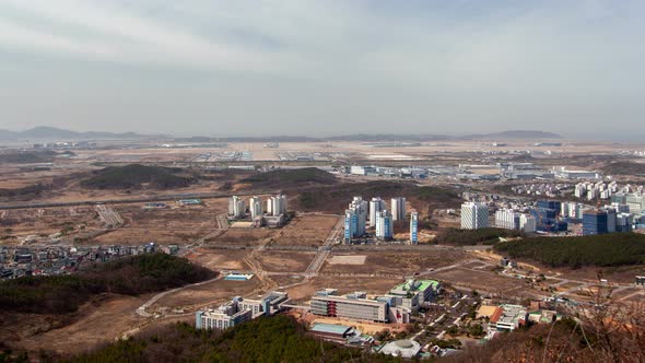 Timelapse Incheon Buildings Surrounded By Fields Forests