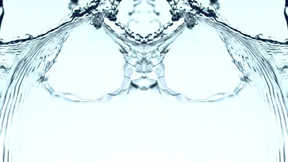 Super Slow Motion Shot of Mirrored Water Splash at 1000Fps on White Background.