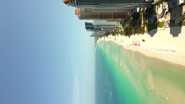 Vertical Aerial Rise Reveal Beach Towers Sunny Isles Miami Fl 4k