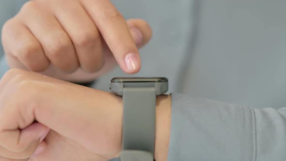 Hands Close Up of African Woman Using Smart Watch