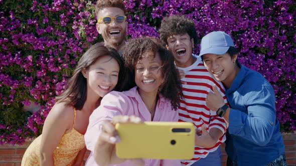 Group of friends having fun on the beach.