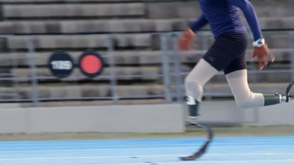 Disabled athletic running on a running track 4k