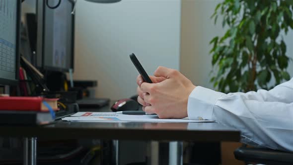 Trader Using Mobile Phone