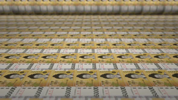 50000 South Korean won bills on money printing machine.