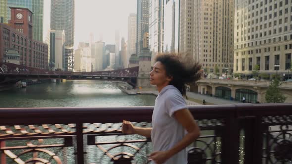 Attractive African American woman on her morning jog along the Chicago River