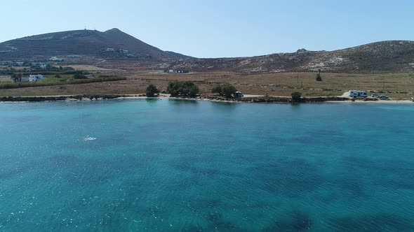 Piperi beach in Naoussa on Paros island in the Cyclades in Greece aerial view