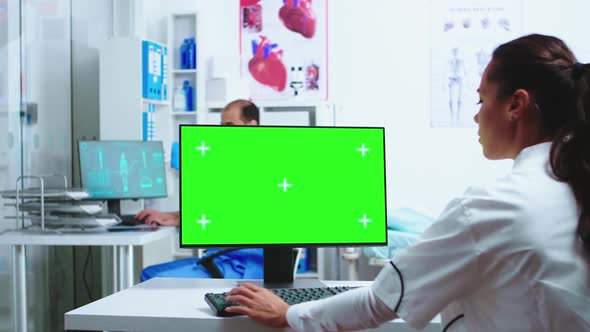 Assistant Giving Doctor Patient Xray
