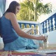 Young female artist painting a pineapple by watercolors - VideoHive Item for Sale