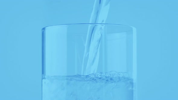 Glass Of Water Poured In Lab