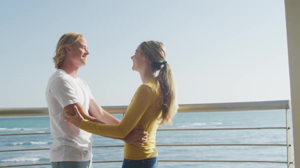 Couple embracing each other on the terrace