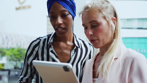 Beautiful business women working in the city