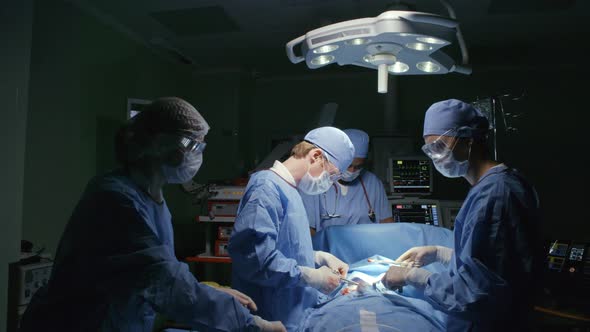 Skillful Surgeons Performing Procedure