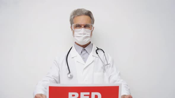 Written Text Red Zone and Doctor Man in a White Hazmat Suit Isolated