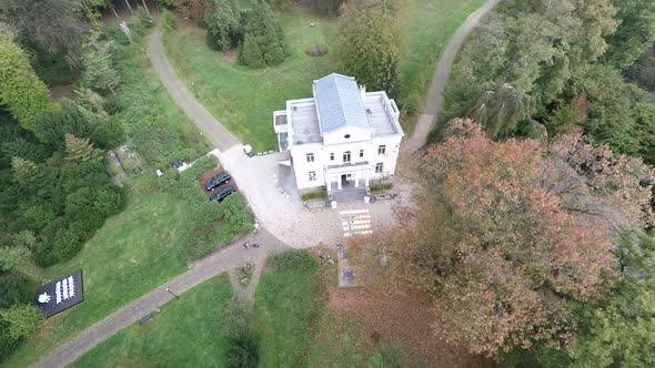 Drone flying towards mansion on estate. Landgoed de Paltz, Soest, the Netherlands.