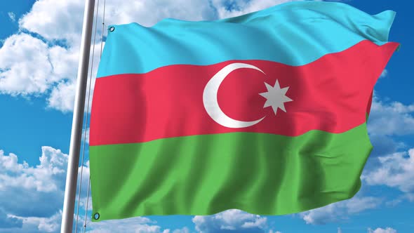 Flying Flag of Azerbaijan on Sky Background alt